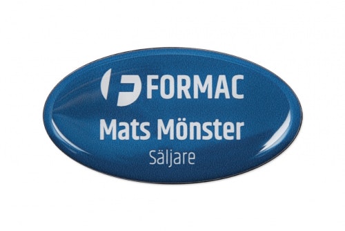 Name tag ellipse-shaped with 3D-emblem and pin